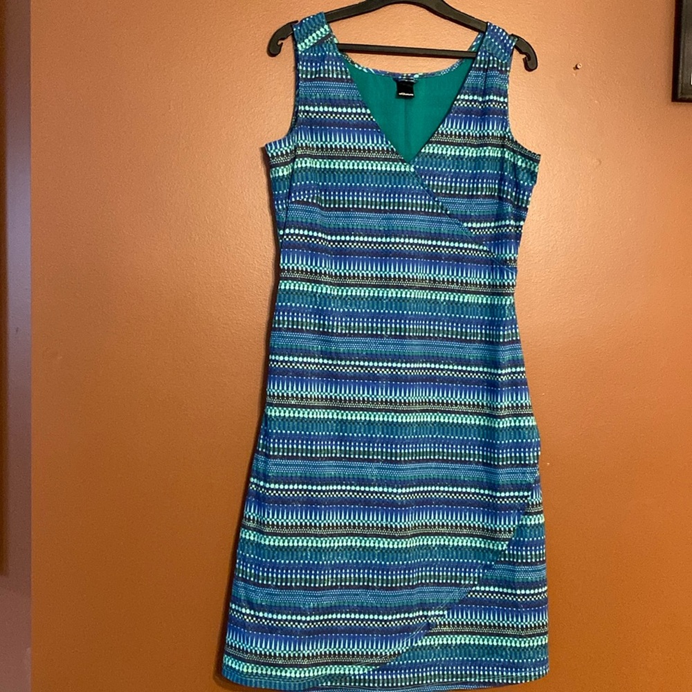 Ladies dress made by Skunkfunk in size 3. Fully lined, sleeveless with V-neck.